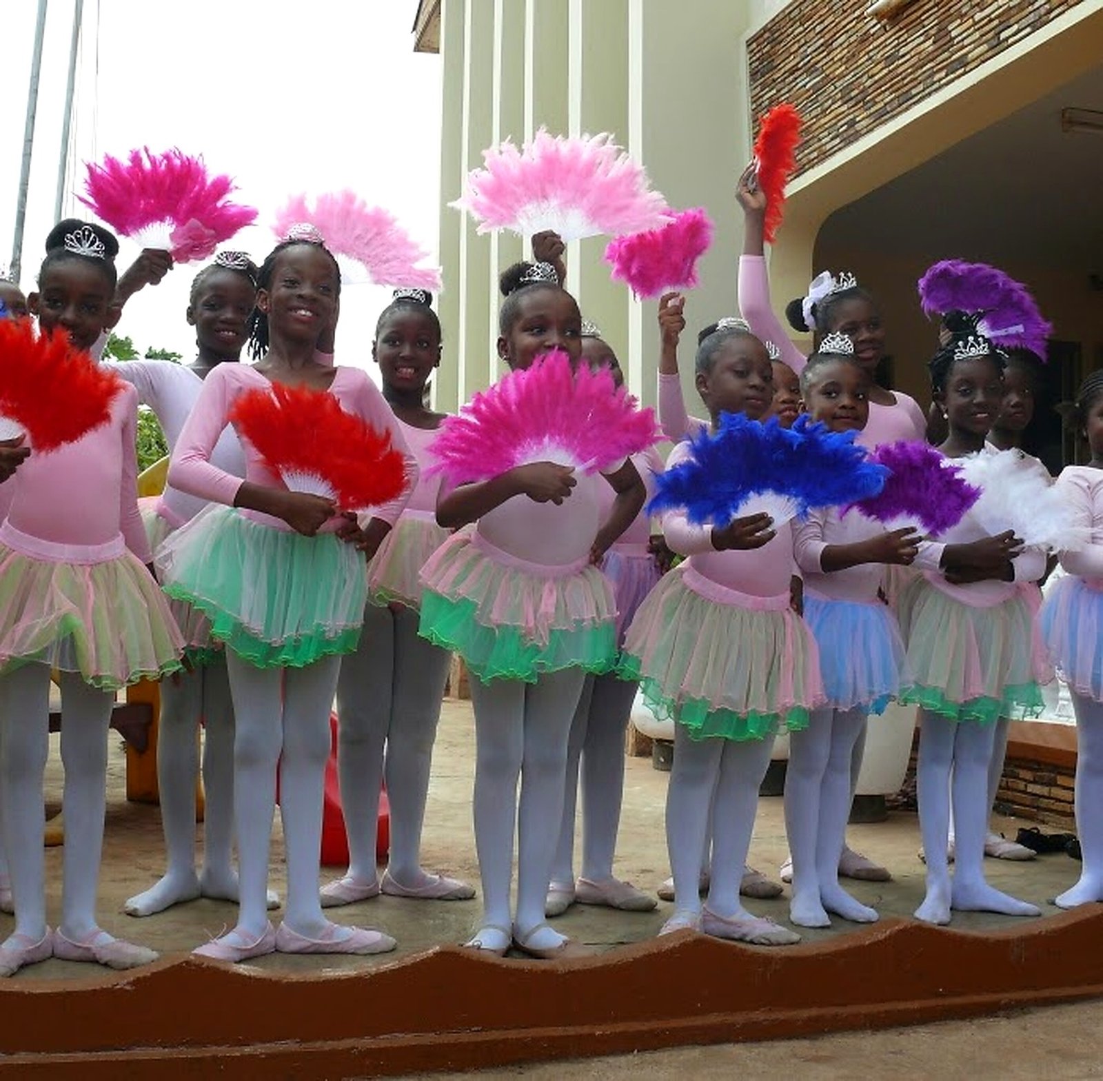 Students performing with dance props